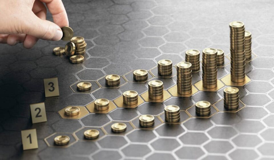 hand stacks coins