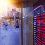 a sign flashes global stock data