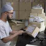 scanning a package shipping label for ecommerce delivery