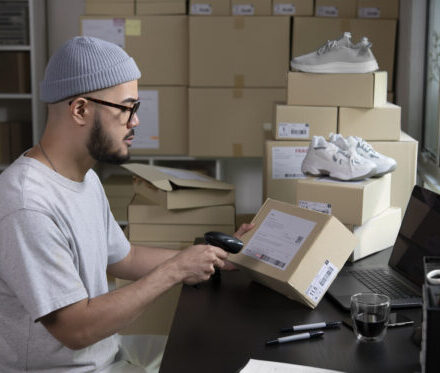 scanning a package shipping label for ecommerce delivery