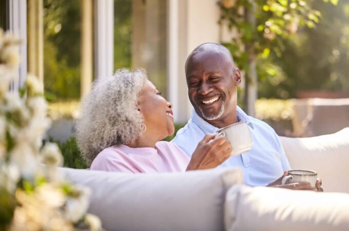Retirees sip their morning coffee outside.
